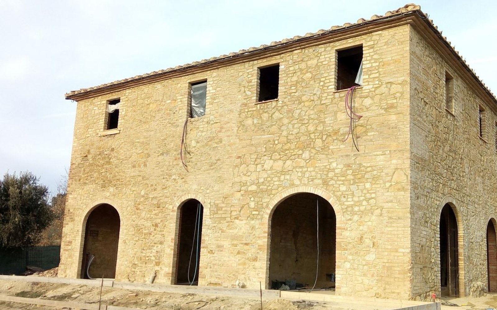 Edificio in pietra durante il recupero